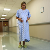 Expectant mother in hallway of hospital