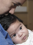 Latina Baby in Mother's arms