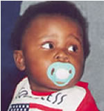 african amercian baby with a pacifier